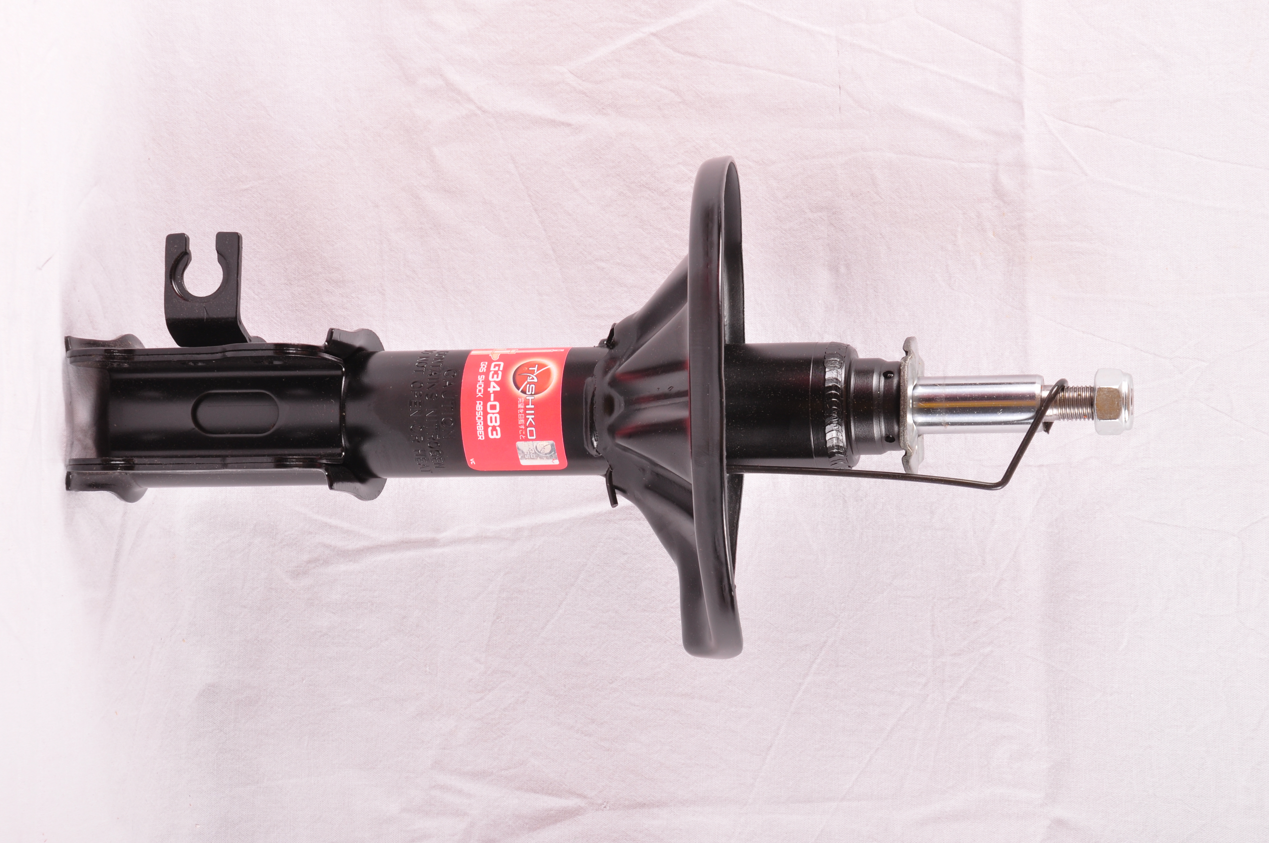 Стійка амортизатора Tashiko передня ліва Mazda 626 GE, MX-6 Xedos 6 1991-1997 334083
